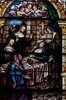 St. Rita receives a rose that had miraculously grew in winter